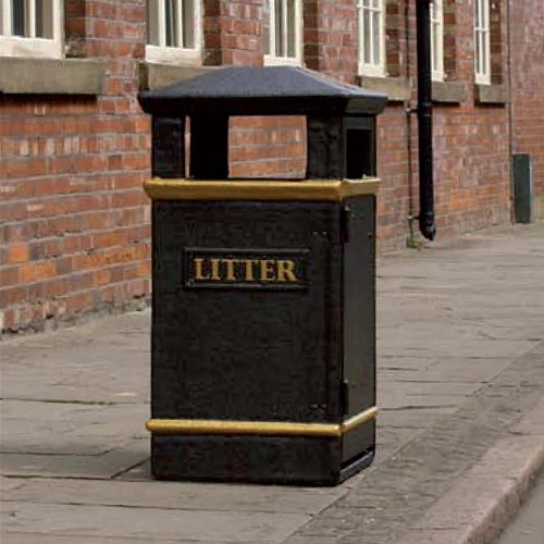 Closed top black GFC litter bin in an outdoor setting.