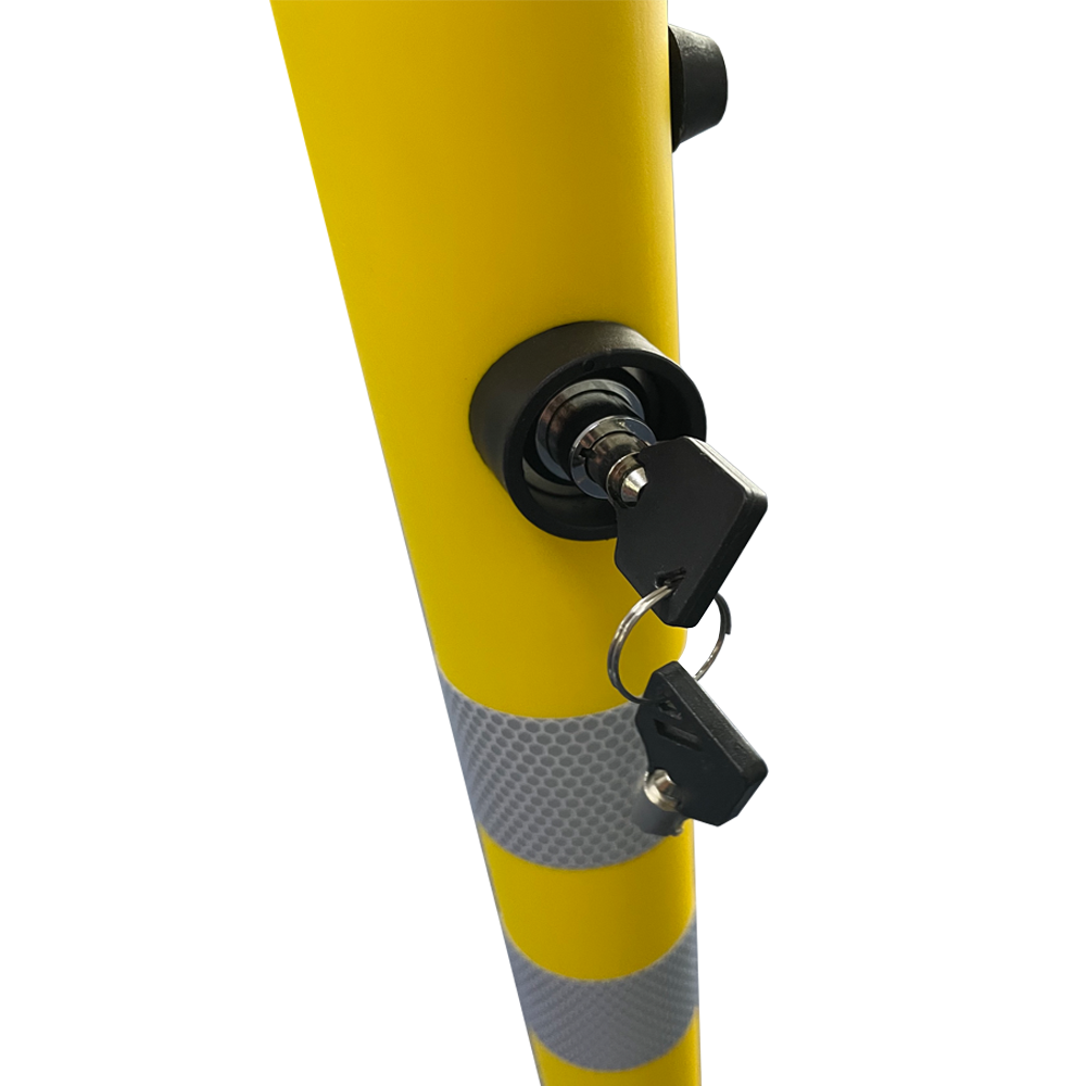 Close up of the key in the lock for the plastic bollard.