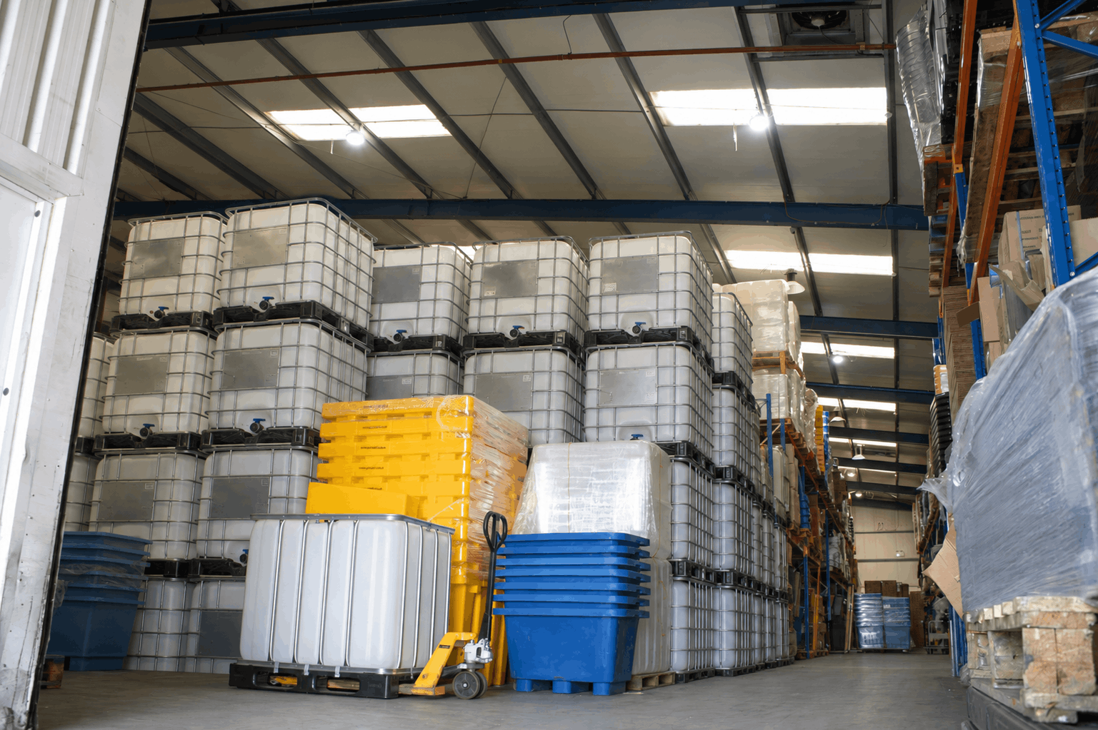 IBC containers and plastic bins stored in the Kingfisher Direct warehouse
